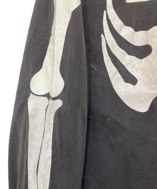SAINT MICHAEL（セントマイケル）SAINT MICHAEL BOUNTY HUNTER SAINT MICHAEL　BH LS T-SHIRT/BONE　ビーエイチロングスリーブTシャツボーン　26SS　SM-MK8-0000-C30 ブラック サイズ:XLの古着・服飾アイテム