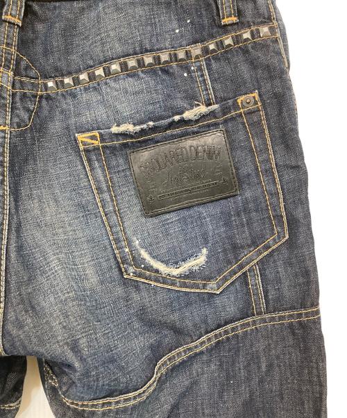 DSQUARED2（ディースクエアード）DSQUARED2 (ディースクエアード) ダメージ加工スタッズデニムパンツ インディゴ サイズ:50の古着・服飾アイテム