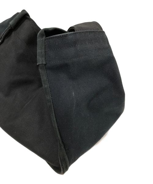 COMME des GARCONS HOMME PLUS（コムデギャルソンオムプリュス）COMME des GARCONS HOMME PLUS (コムデギャルソンオムプリュス) コットンツイルロゴニュースペーパーバッグ PS-K202 ブラックの古着・服飾アイテム