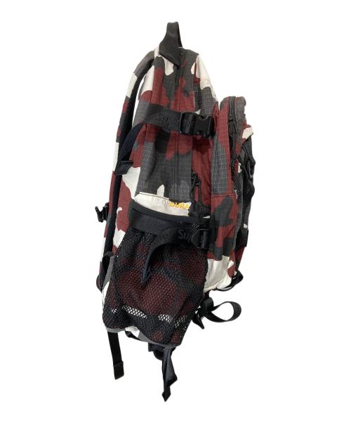 SUPREME（シュプリーム）SUPREME (シュプリーム) Logo Backpack (Red Camo)　ロゴバックパック（レッドカモ）26SS レッド×ブラックの古着・服飾アイテム