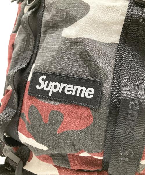 SUPREME（シュプリーム）SUPREME (シュプリーム) Logo Backpack (Red Camo)　ロゴバックパック（レッドカモ）26SS レッド×ブラックの古着・服飾アイテム