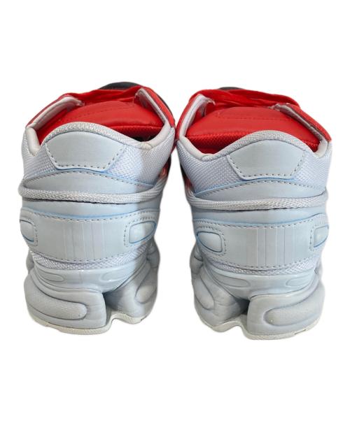 adidas（アディダス）adidas (アディダス) RAF SIMONS (ラフシモンズ) Replicant Ozweego　プリカント オズウィーゴ　EE7933 Red/Halo Blue サイズ:26.5の古着・服飾アイテム