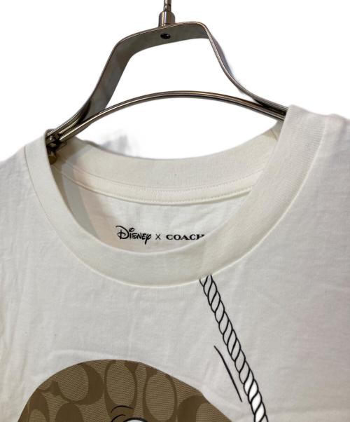 COACH（コーチ）COACH (コーチ) DISNEY (ディズニー) ロープクライム ミッキーマウス シグネチャー Tシャツ ブラウン×ホワイト サイズ:Sの古着・服飾アイテム