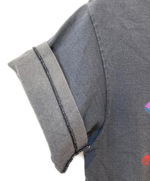 ANDAZIA（アンダジア）ANDAZIA (アンダジア) 90’sカメレオン プリントTシャツ イエロー×ブラック サイズ:Mの古着・服飾アイテム