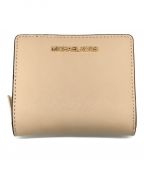 MICHAEL KORSマイケル・コース）の古着「JET SET TRAVEL 2つ折り財布」｜ベージュ