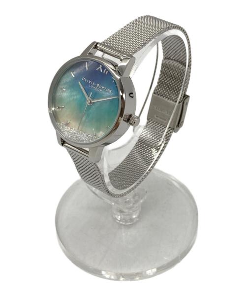 OLIVIA BURTON（オリビアバートン）OLIVIA BURTON (オリビアバートン) アンダーザシー - ミディ ウィッシングウェーブズ ブルーマザーオブパール＆シルバーメッシュ ブルー サイズ:-の古着・服飾アイテム