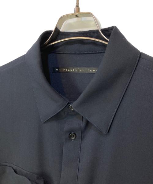 My Beautiful Landlet（マイビューティフルランドレット）My Beautiful Landlet (マイビューティフルランドレット) TROPICAL CLOTH BIG POCKET POLO ネイビーの古着・服飾アイテム