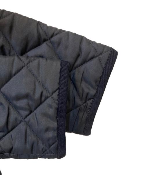 Traditional Weatherwear（トラディショナルウェザーウェア）Traditional Weatherwear (トラディショナルウェザーウェア) ARKLEY W/HOOD フード付 ノーカラーキルティングジャケット ネイビー サイズ:36の古着・服飾アイテム