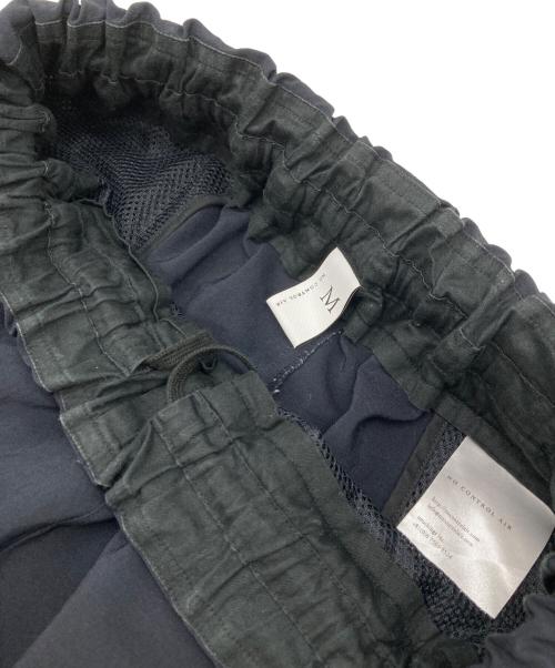 NO CONTROL AIR（ノーコントロールエアー）NO CONTROL AIR (ノーコントロールエアー) 強撚ポリエステル・ストレッチポプリンカーゴパンツ ブラック サイズ:Mの古着・服飾アイテム