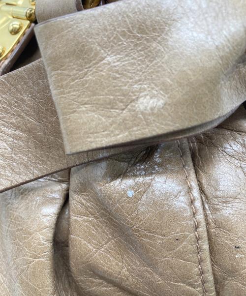 MIU MIU（ミュウミュウ）Mughetto Pink Vitello Lux Leather Bow Small Top Handle Bag/ムゲット ピンク ヴィテッロ ラックス レザー ボウ スモール トップハンドルバッグ サイドリボン2WAYバッグの古着・服飾アイテム