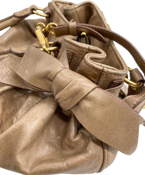 MIU MIU（ミュウミュウ）Mughetto Pink Vitello Lux Leather Bow Small Top Handle Bag/ムゲット ピンク ヴィテッロ ラックス レザー ボウ スモール トップハンドルバッグ サイドリボン2WAYバッグの古着・服飾アイテム