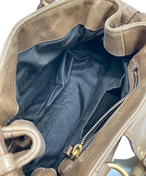 MIU MIU（ミュウミュウ）Mughetto Pink Vitello Lux Leather Bow Small Top Handle Bag/ムゲット ピンク ヴィテッロ ラックス レザー ボウ スモール トップハンドルバッグ サイドリボン2WAYバッグの古着・服飾アイテム