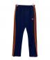 Needles（ニードルズ）の古着「Narrow Track Pant」｜ネイビー