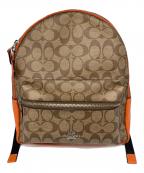 COACHコーチ）の古着「チャーリー ミディアム シグネチャー リュックサック」｜ベージュ×オレンジ