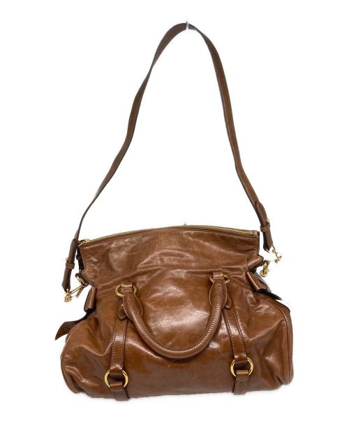 MIU MIU（ミュウミュウ）MIU MIU (ミュウミュウ) VITELLO LUX ヴィッテロリュクス サイドリボン 2WAYハンドバッグ ブラウンの古着・服飾アイテム