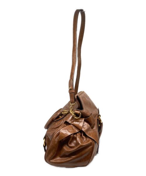 MIU MIU（ミュウミュウ）MIU MIU (ミュウミュウ) VITELLO LUX ヴィッテロリュクス サイドリボン 2WAYハンドバッグ ブラウンの古着・服飾アイテム