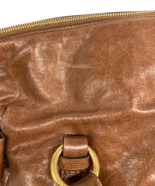 MIU MIU（ミュウミュウ）MIU MIU (ミュウミュウ) VITELLO LUX ヴィッテロリュクス サイドリボン 2WAYハンドバッグ ブラウンの古着・服飾アイテム