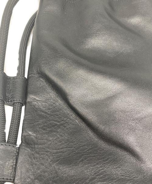 NOMADIS（ノマディス）NOMADIS (ノマディス) CREW PRT レザー巾着ショルダーバッグ ブラックの古着・服飾アイテム