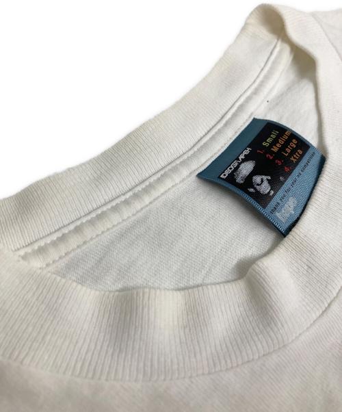 A BATHING APE（アベイシングエイプ）A BATHING APE (アベイシングエイプ) MOUT Exhibition Print Tee ホワイト サイズ:Sの古着・服飾アイテム