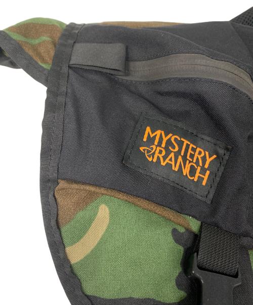 MYSTERY RANCH（ミステリーランチ）MYSTERY RANCH (ミステリーランチ) INVADER カモフラ柄 メッセンジャーバッグ グリーン サイズ:なしの古着・服飾アイテム