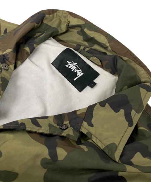 stussy（ステューシー）stussy (ステューシー) カモフラ柄 サークルロゴコーチジャケット カーキ サイズ:Lの古着・服飾アイテム