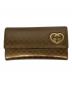 GUCCI（グッチ）の古着「ラブリーハート グッチシマ ラウンドジップウォレット」｜ベージュ