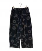 marimekkoマリメッコ）の古着「Finaali Pieni Unikko / ウニッコ柄スウェットパンツ」｜ブラック