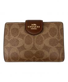 COACH（コーチ）の古着「ミディアム コーナー ジップ ウォレット・シグネチャー キャンバス」｜タン/ブラウン