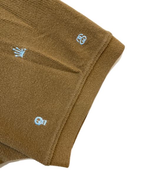 stussy（ステューシー）stussy (ステューシー) 00’s ランダムロゴポロシャツ ブラウン サイズ:XLの古着・服飾アイテム