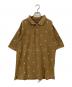 stussy（ステューシー）の古着「00’s ランダムロゴポロシャツ」｜ブラウン