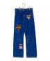 MARNI（マルニ）の古着「BLUE COATED DENIM JEANS WITH MOHAIR PATHES OCEAN モヘアパッチ デニムパンツ」｜インディゴ