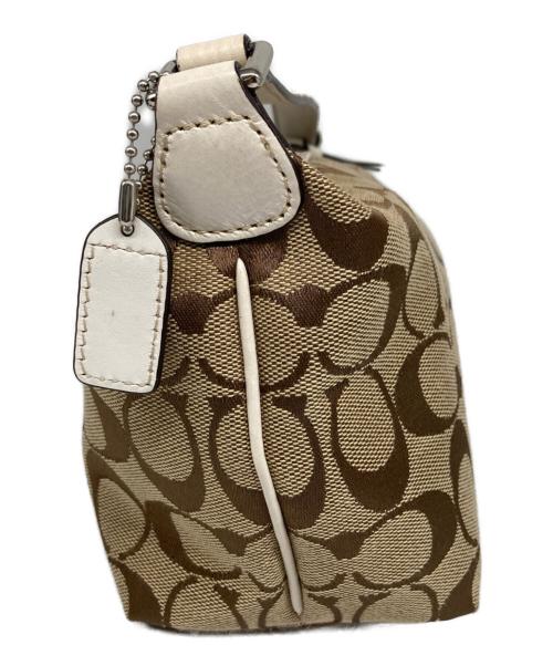 COACH（コーチ）COACH (コーチ) シグネチャー アクセサリーポーチ ベージュの古着・服飾アイテム