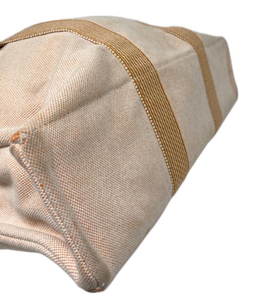 HERMES（エルメス）HERMES (エルメス) ニューフールトゥ MM トートバッグ オレンジの古着・服飾アイテム