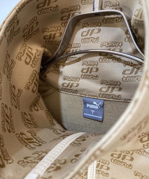 PUMA（プーマ）PUMA (プーマ) CORE HERITAGE モノグラム トラック ジャケット ベージュ サイズ:Mの古着・服飾アイテム