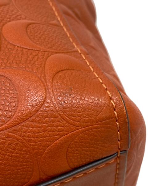 COACH（コーチ）COACH (コーチ) Large Signature Embossed Leather Tote オレンジの古着・服飾アイテム