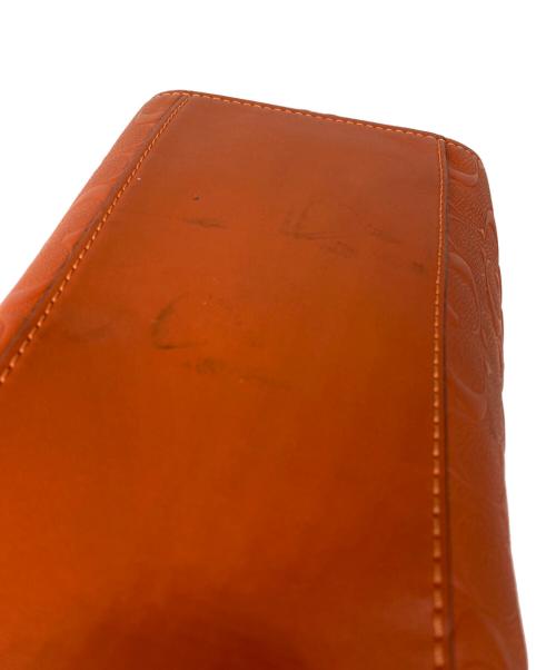 COACH（コーチ）COACH (コーチ) Large Signature Embossed Leather Tote オレンジの古着・服飾アイテム