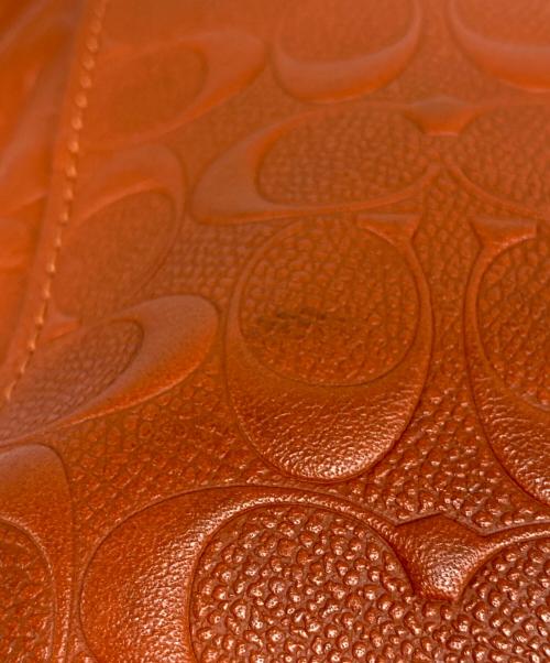 COACH（コーチ）COACH (コーチ) Large Signature Embossed Leather Tote オレンジの古着・服飾アイテム