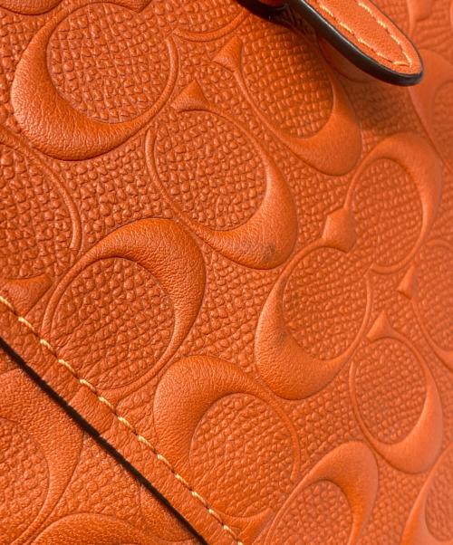COACH（コーチ）COACH (コーチ) Large Signature Embossed Leather Tote オレンジの古着・服飾アイテム