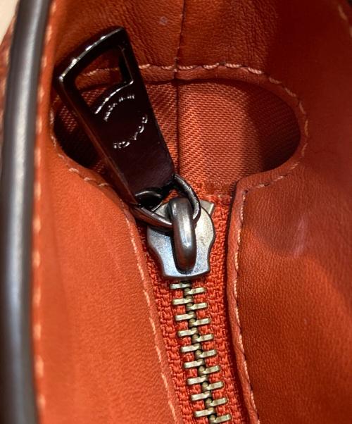 COACH（コーチ）COACH (コーチ) Large Signature Embossed Leather Tote オレンジの古着・服飾アイテム