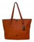 COACH（コーチ）の古着「Large Signature Embossed Leather Tote」｜オレンジ
