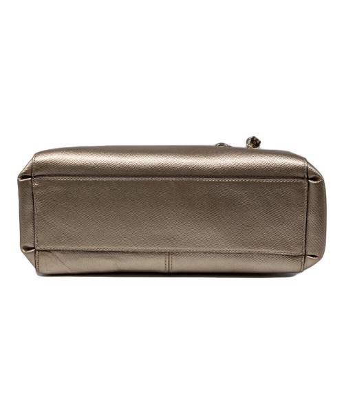 COACH（コーチ）COACH (コーチ) Small Christie Carryall メタリックレザー 2WAYショルダーバッグ ベージュの古着・服飾アイテム