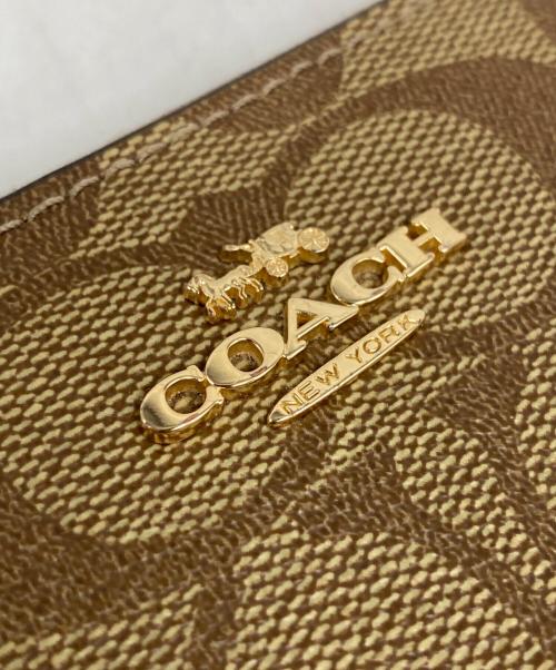 COACH（コーチ）COACH (コーチ) ロング ジップ アラウンド ウォレット シグネチャー キャンバス ブラウンの古着・服飾アイテム