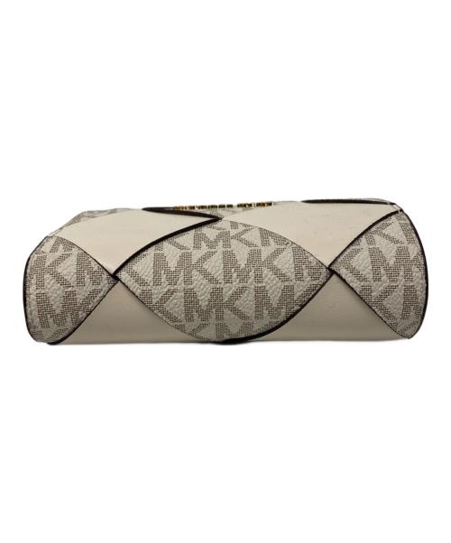 MICHAEL KORS（マイケルコース）MICHAEL KORS (マイケルコース) JET SET TRAVEL ウーヴン ビルフォールド ジップ コンパクト ウォレット ミディアム - MKシグネチャー ライトクリームマルチの古着・服飾アイテム