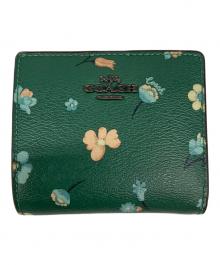 COACH（コーチ）の古着「ミスティカル フローラル スナップ ウォレット」｜グリーン