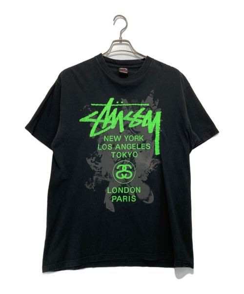 stussy（ステューシー）stussy (ステューシー) WORLD TOUR TEE グリーン×ブラック サイズ:Lの古着・服飾アイテム