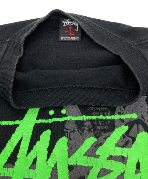 stussy（ステューシー）stussy (ステューシー) WORLD TOUR TEE グリーン×ブラック サイズ:Lの古着・服飾アイテム