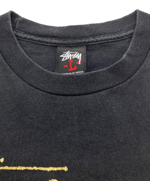 stussy（ステューシー）stussy (ステューシー) TRIBE EXCLUSIVE TEE ブラック サイズ:Lの古着・服飾アイテム