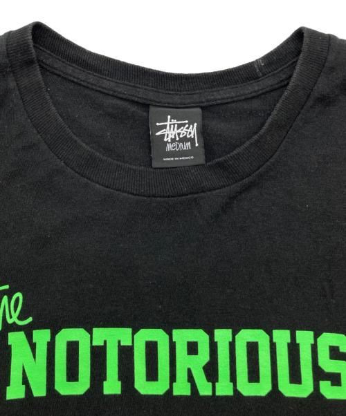 stussy（ステューシー）stussy (ステューシー) NOTORIOUS No.4 プリントTシャツ ブラック×グリーン サイズ:Mの古着・服飾アイテム
