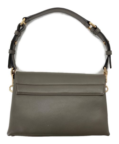 TOD'S（トッズ）TOD'S (トッズ) Tタイムレスレザーフラップバッグミニ ブラウンの古着・服飾アイテム