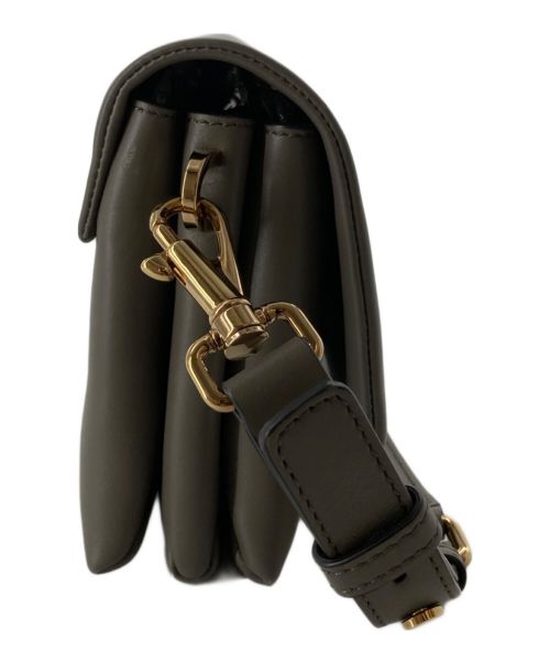 TOD'S（トッズ）TOD'S (トッズ) Tタイムレスレザーフラップバッグミニ ブラウンの古着・服飾アイテム